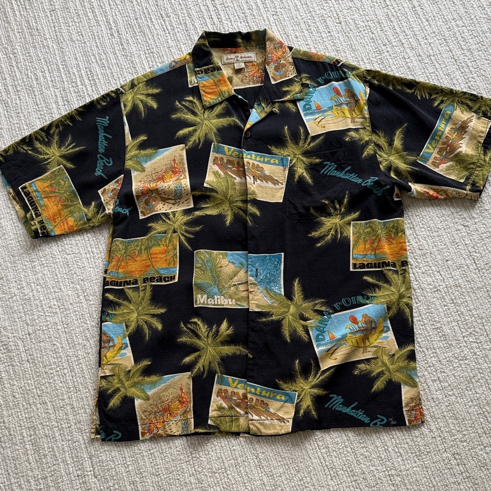 Men’s Tommy bahama short sleeve shirt.  Size medium.  100% silk.  Washable